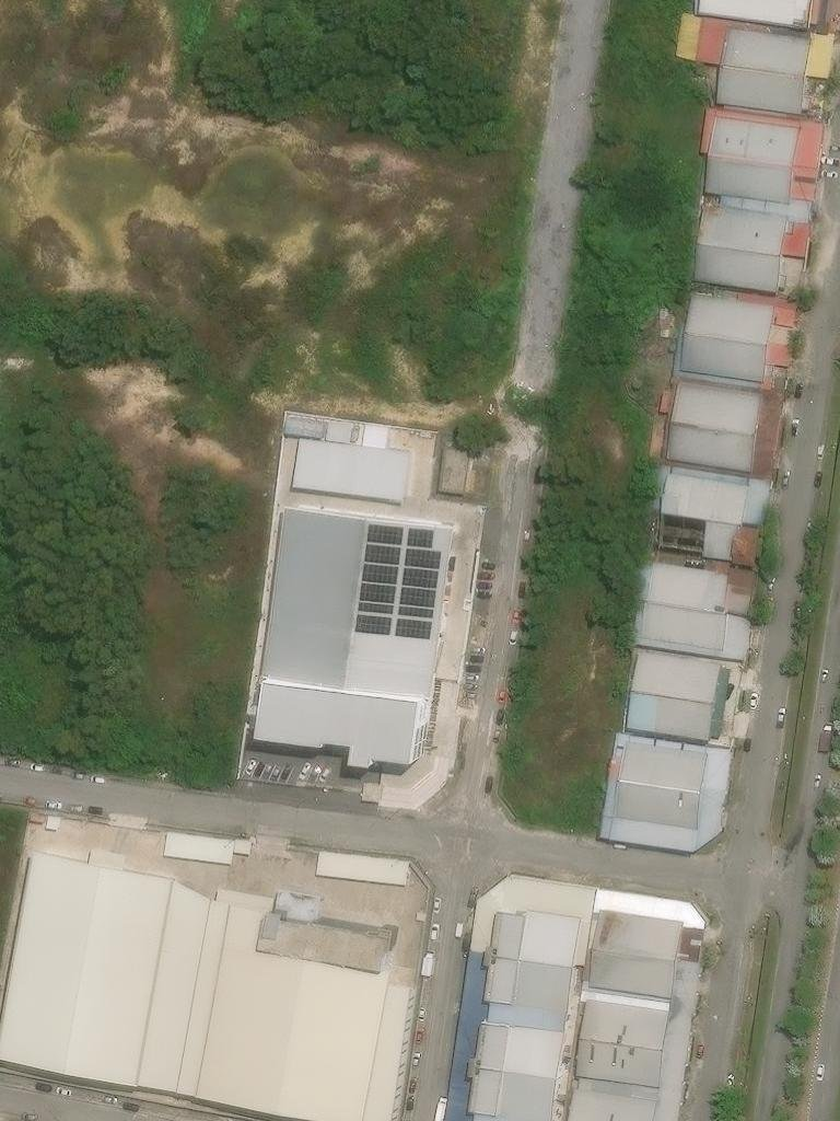 Satellite view of the Dr Orizi plant at Persiaran Perindustrian Pengkalan, Ipoh, showing solar panels covering the factory roof